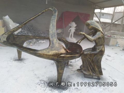 抽象弹钢琴人物铜雕