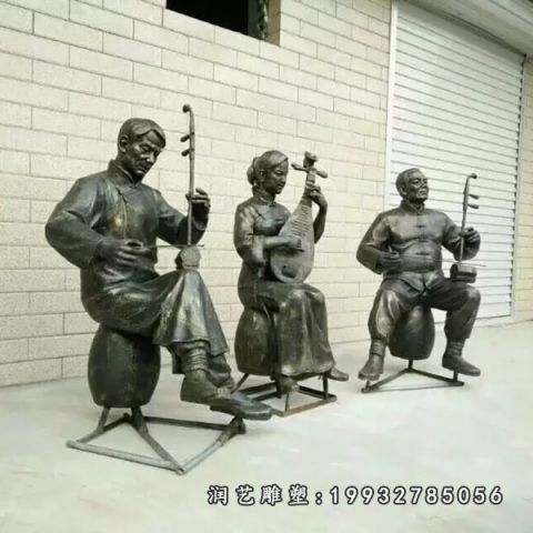 广场演奏人物铜雕