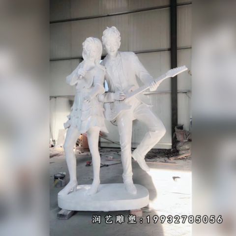 城市人物情侣石雕