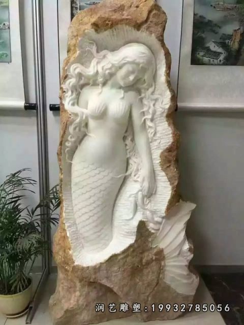 步行街美人鱼石雕
